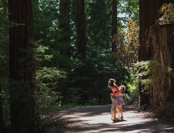Mother and daughter on the trail at Bear Creek Redwoods.