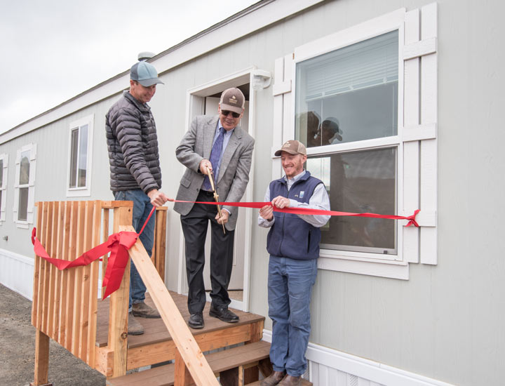 Ribbon cutting ceremony for newly installed farmworker housing. 