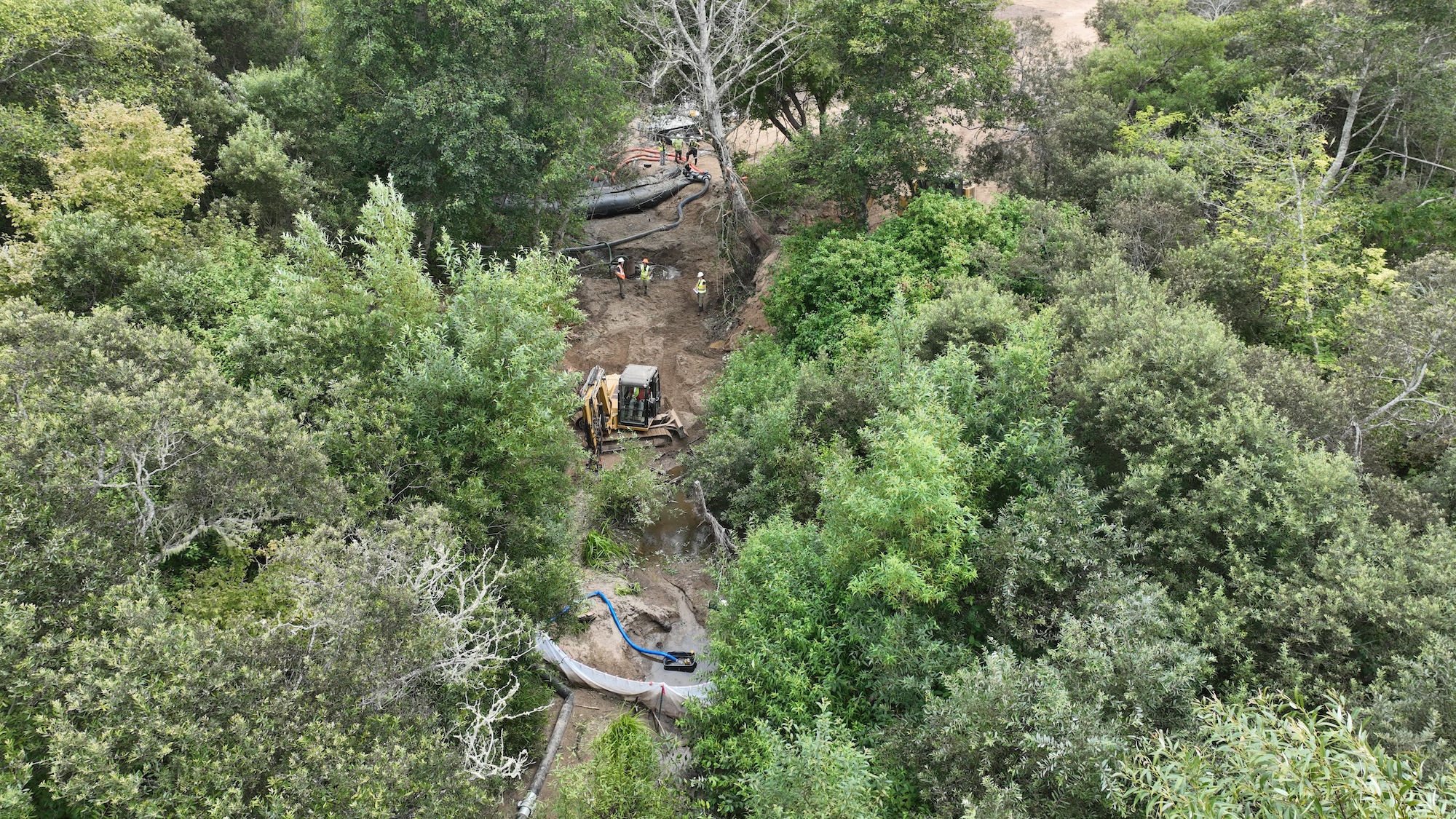 An aerial view shows the construction happening at the Butano Creek Restoration site.